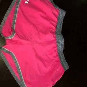 Under armor hot pink shorts (adult small)